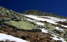 Chopok (2,024 m) is the second highest peak of the Low Tatra range (just after the neighboring Ďumbier mountain), in central Slovakia. The peak offers a panoramatic view of High Tatra, Liptov and the valley of Hron. There is a chalet (called Kamenná cha